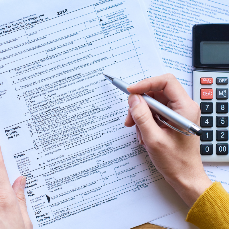 paperwork and tools for tax preparation Maurice LA